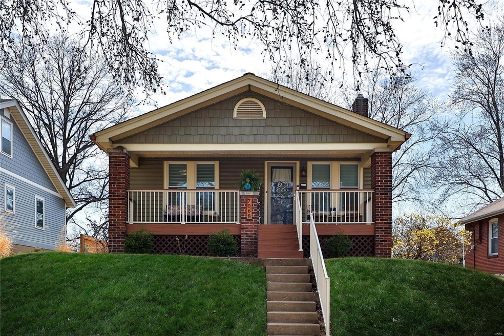 Home has great curb appeal and ample front porch.