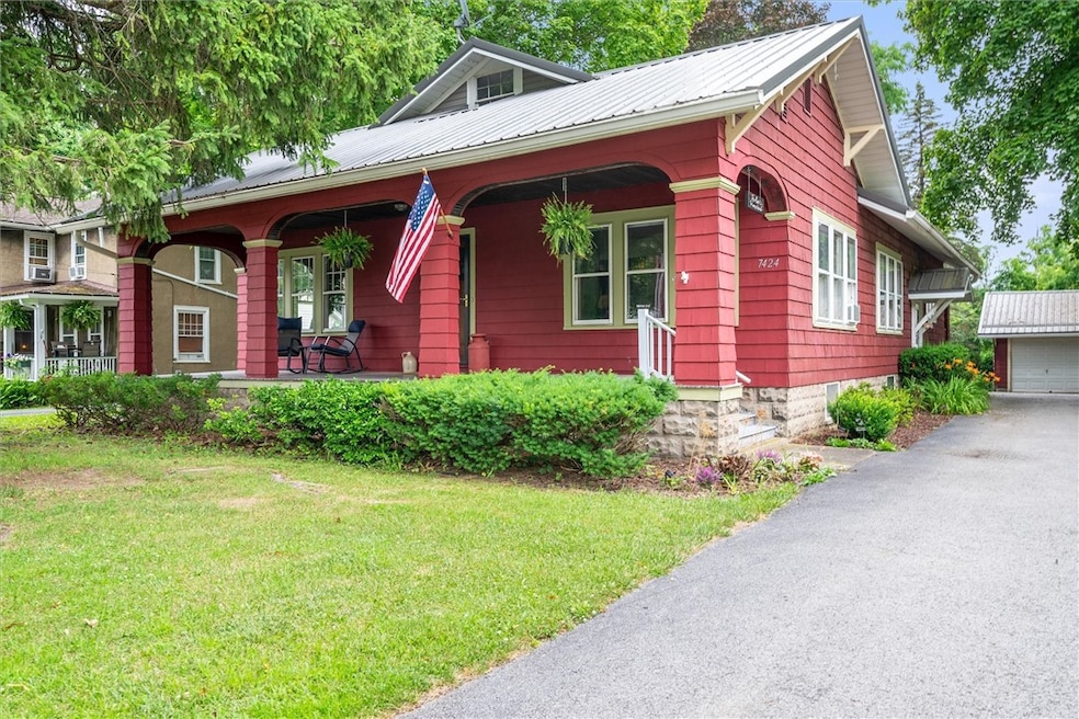 Welcome to 7424 — a charming 1920 classic with a w