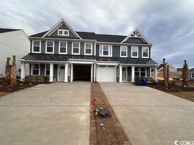 Craftsman-style home featuring a garage