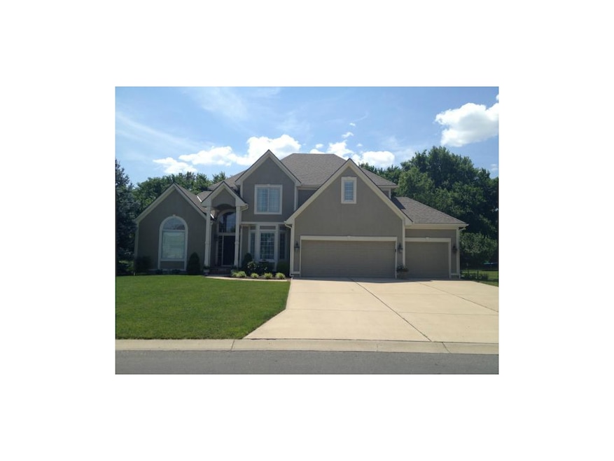 Great curb appeal with fabulous landscaping!