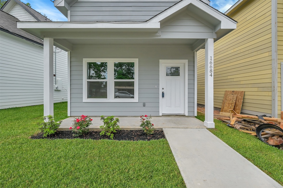 Charming front porch on your new two story home.