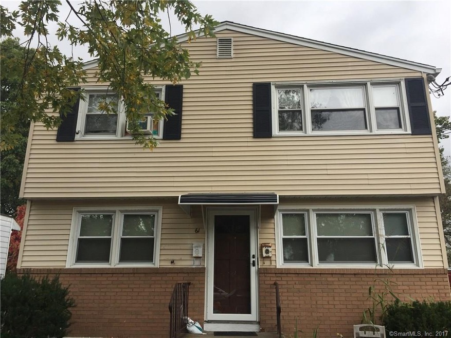 Attractive Exterior with vinyl and brick siding. T