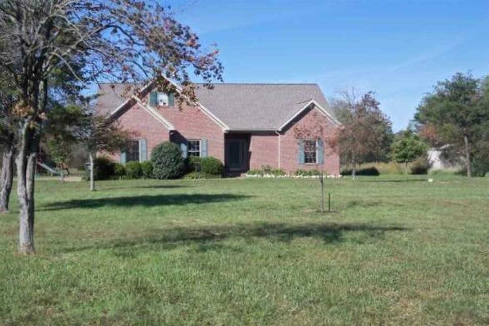 This gorgeous 4-Bedroom Home sits on a Lake with 2