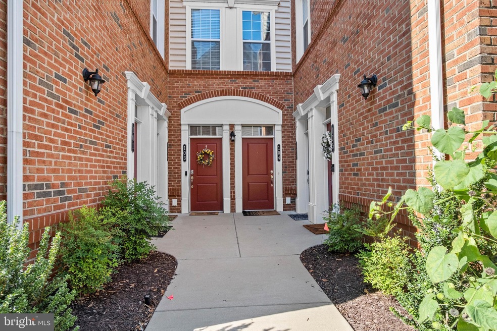 23305 Milltown Knoll Square unit 104, Ashburn, VA 20148 - photo 1