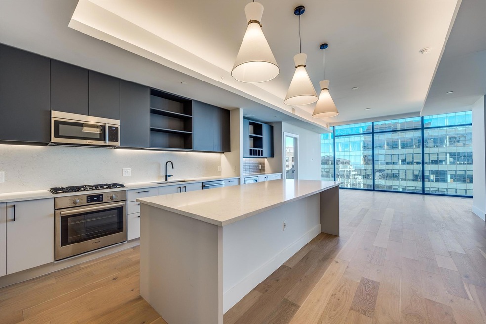 Kitchen featuring sink, hanging light fixtures, st