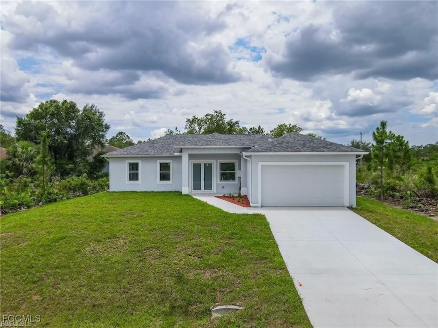 744 Clancy St E, Lehigh Acres, FL 33974 - photo 1