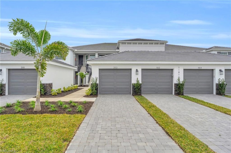 View of front of property with a garage