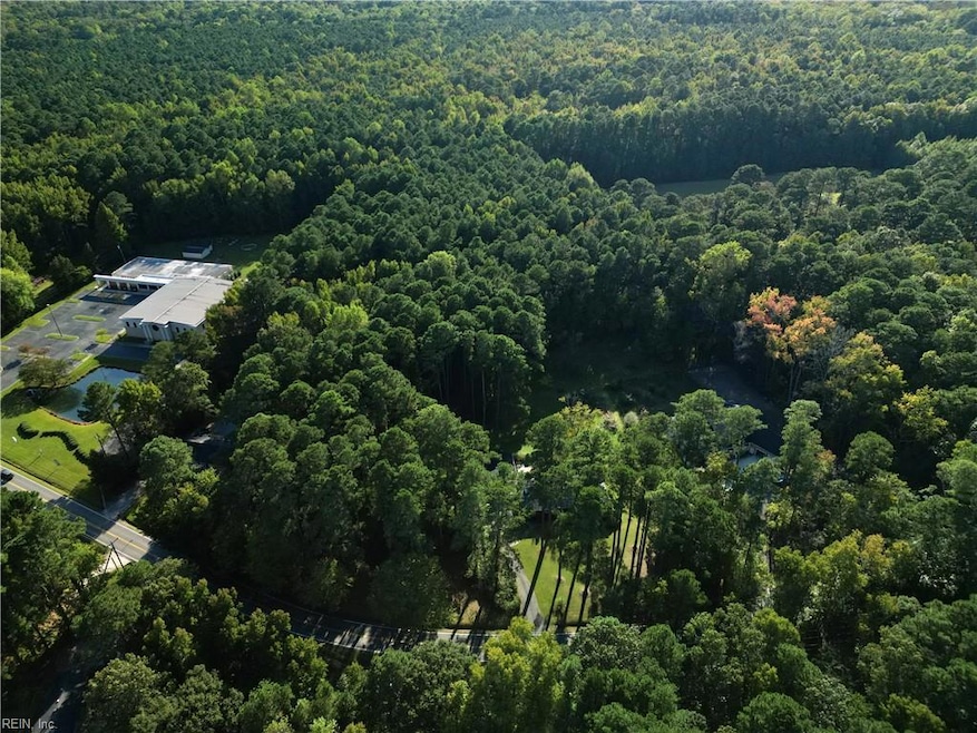 AERIAL VIEW OF WOODED ACREAGE