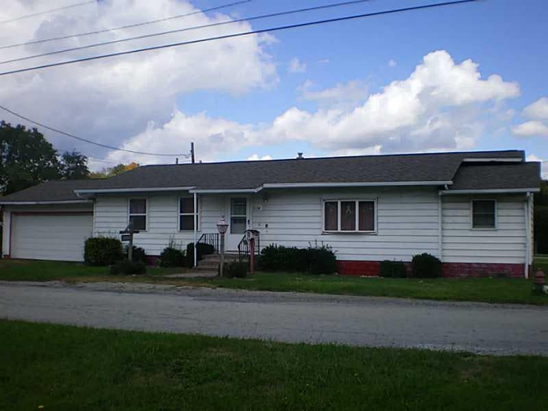 Exterior Front. Great buy on a corner lot!