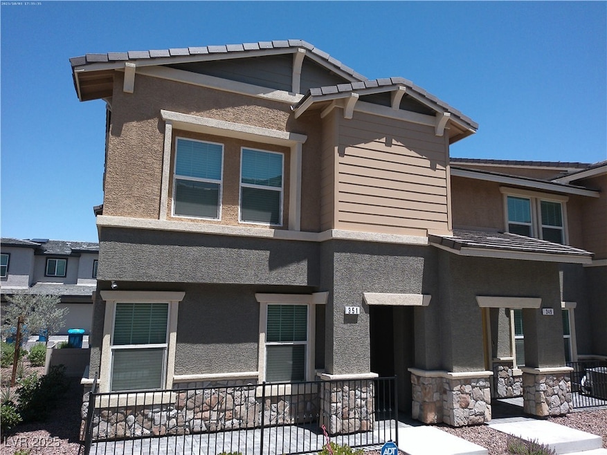 View of front facade featuring stucco siding and c