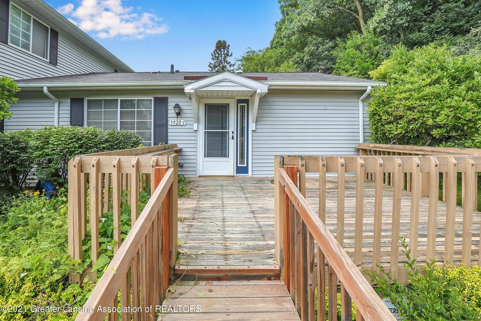 3928 Hunters Ridge Dr unit 1, Lansing, MI 48911 - photo 1