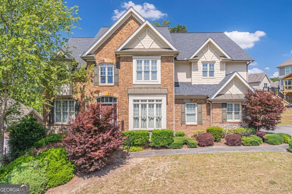 Welcome Home! This beautiful three side brick home
