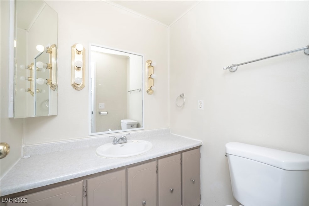Bathroom with toilet and vanity