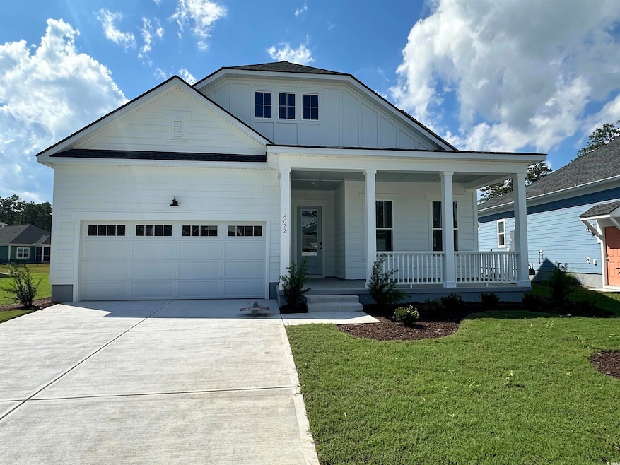 View of front of home featuring covered porch and 