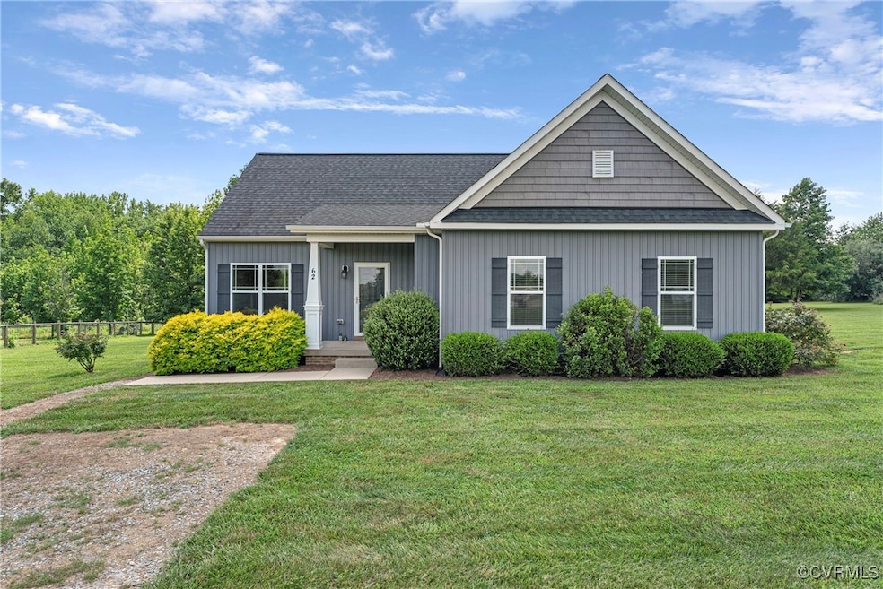 View of front of home featuring a shingled roof an