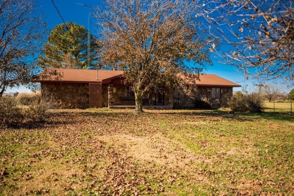 Located close to HWY 62, 15+-Acres of flat, cleare