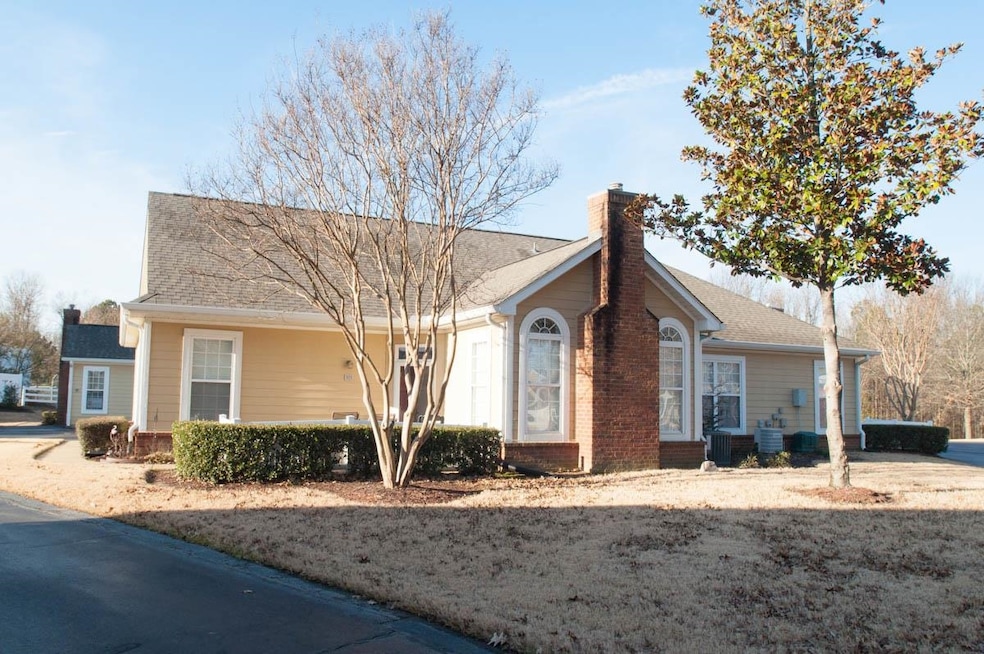 View of front of home with cooling unit