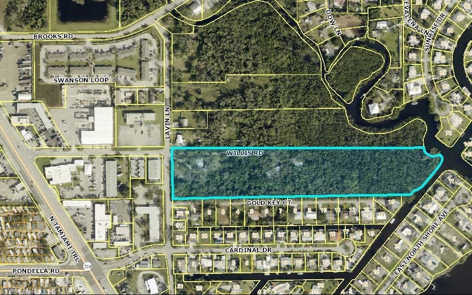 Aerial overview of property's location with property parcel outlined