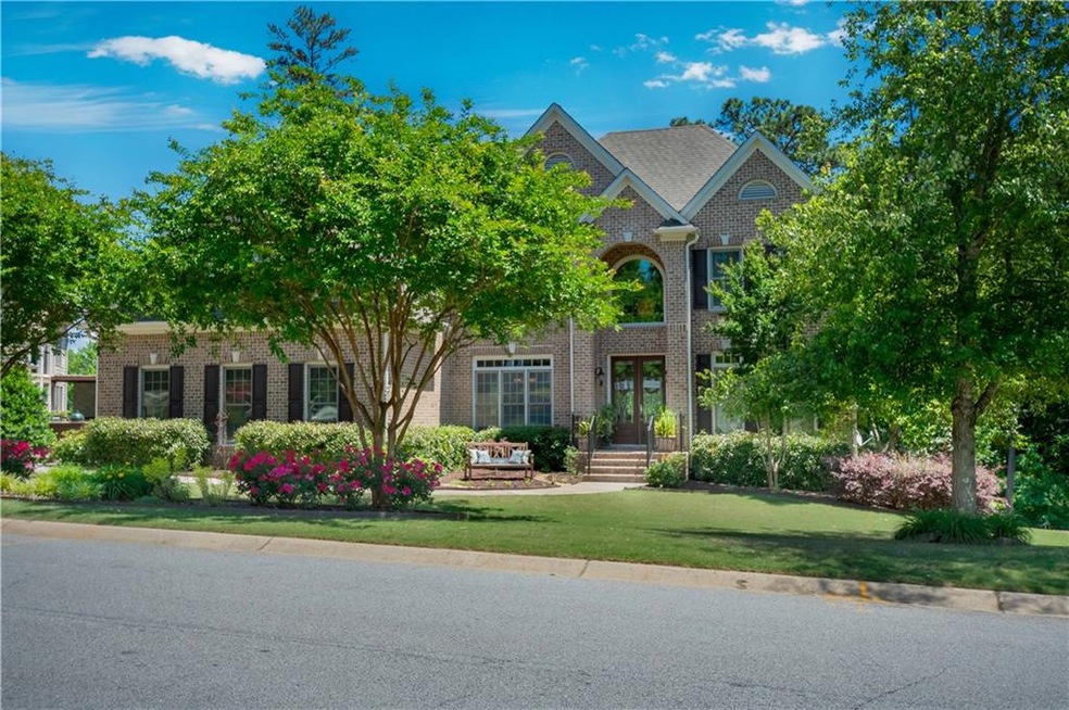 3 sided brick executive home in Vinings Estates