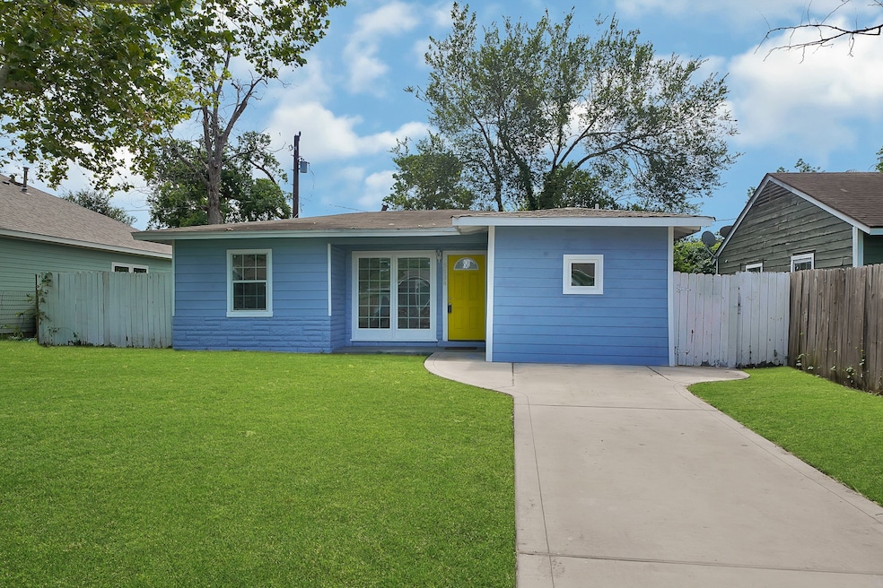 Charming single-story home featuring a light blue