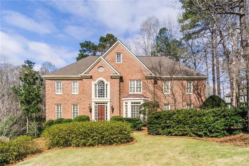 Welcome home to this 3-sided brick beauty!