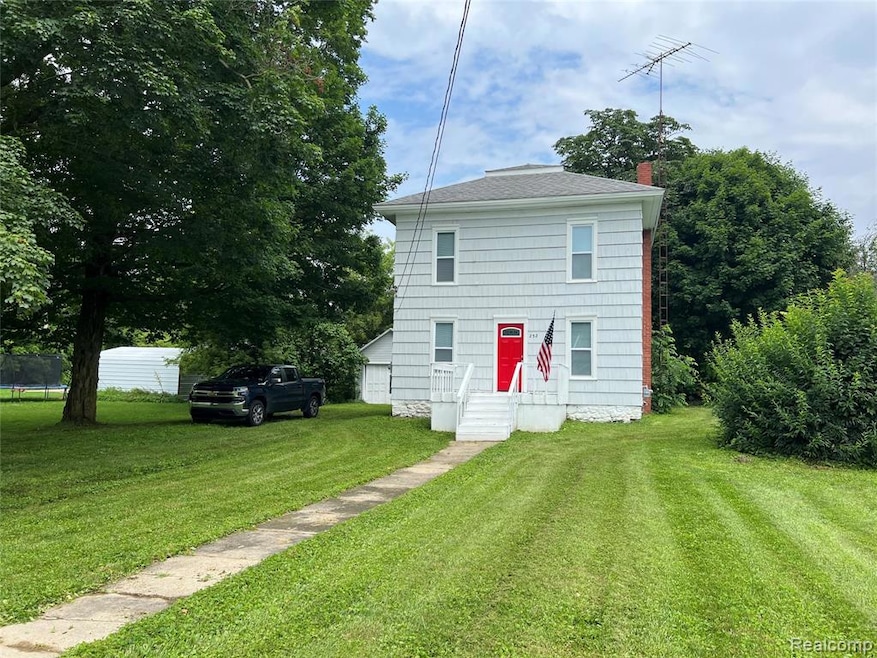 Front of house with large porch.