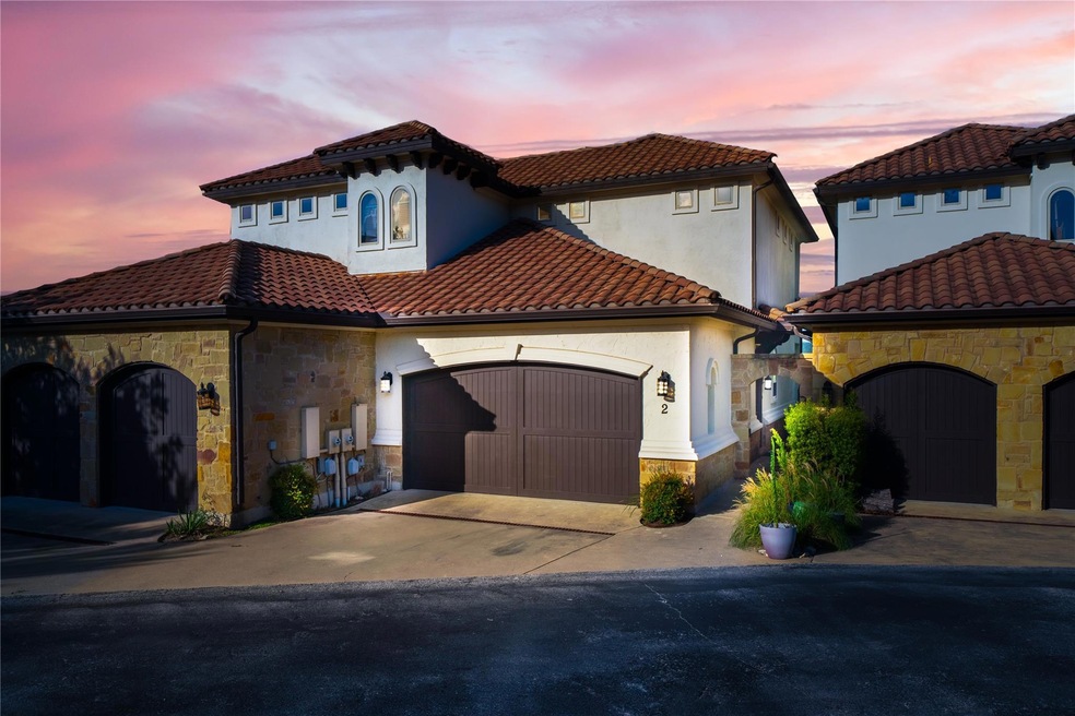 Mediterranean / spanish house with stone siding, 