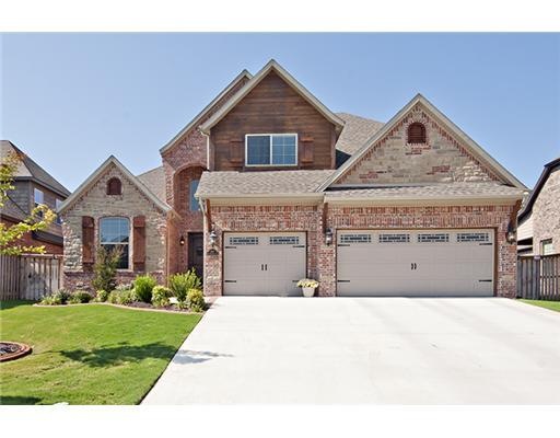 Exterior Front. 3-car garage, brick and stone exterior.  Gorgeous home!
