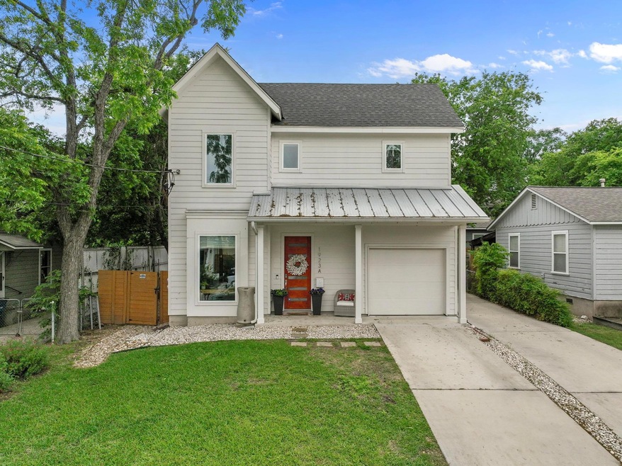 Traditional-style home featuring a standing seam 