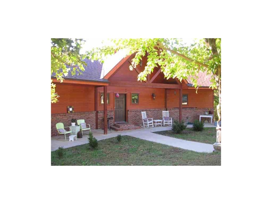 front of home with beautiful porch