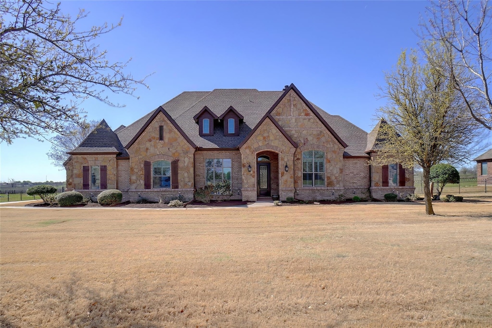 Front view with large front lawn and mature oak tr