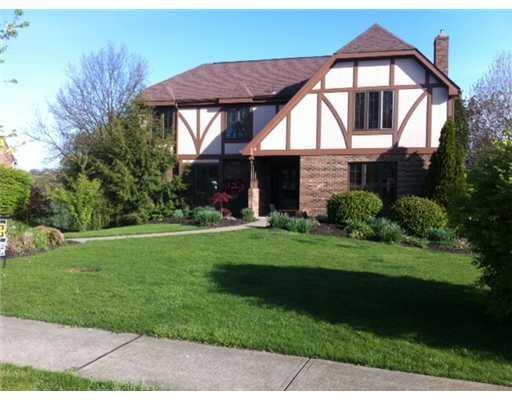 Exterior Front. Lovely brick and stucco home on cu