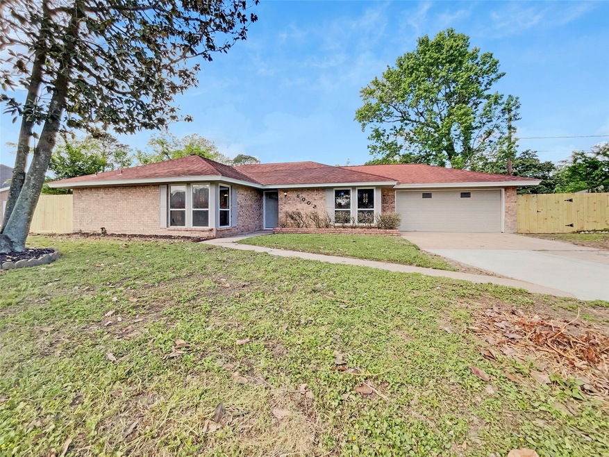 6002 Shady Timbers Dr, Houston, TX 77016 - photo 1