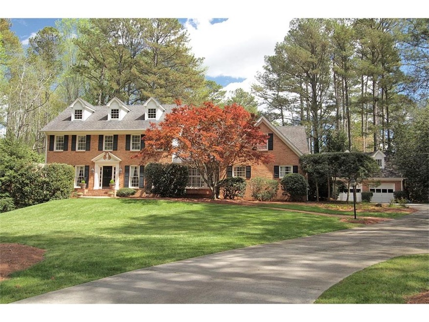 Beautiful curb appeal on 1.5 lovely acres on sough