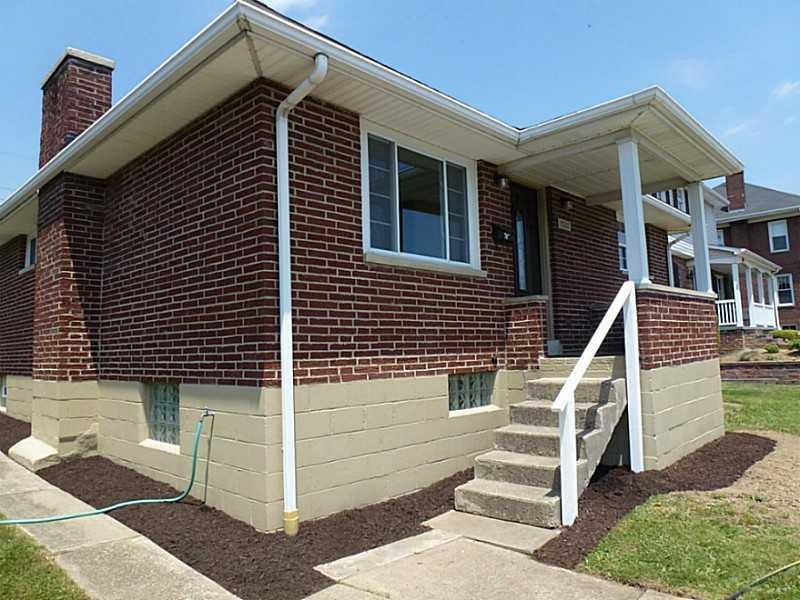 Exterior Front. Annual Flowers make it feel more l