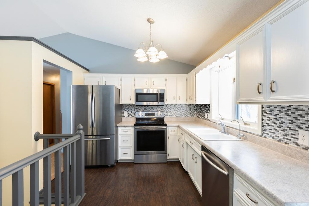 What a gorgeous kitchen! The stairway to the left 