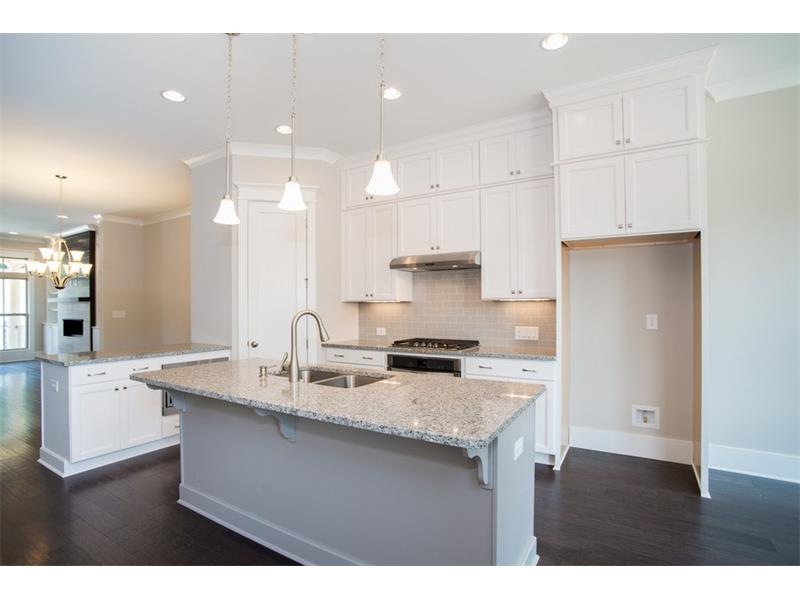 Example Kitchen of a sold home.  Finishes will be 