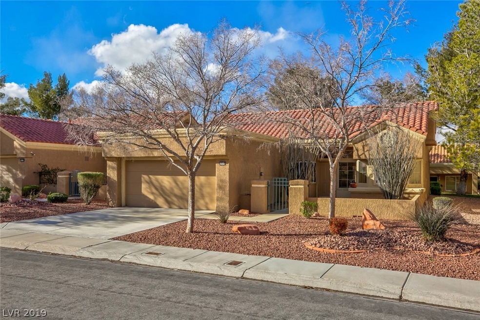 Front View With Inviting Courtyard.