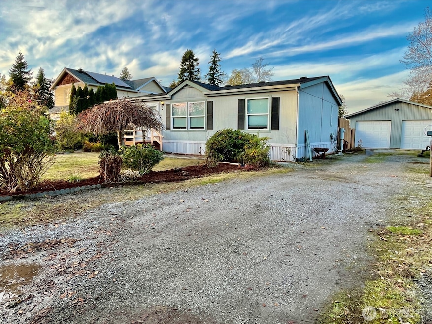 12,000+sq foot lot with 3bed/2 full baths and 2 car garage/shop