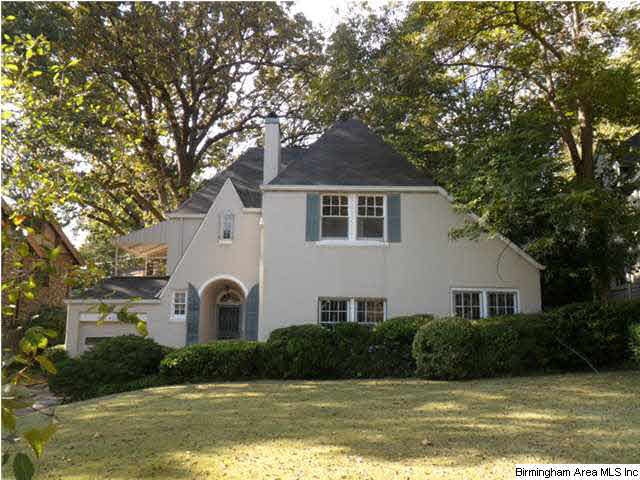 Excellent curb appeal, surrounded by mature trees 