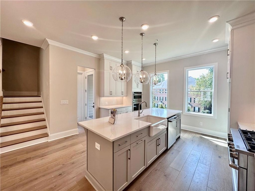 Home Site 19: Willow Gray cabinets with 3 glass gl