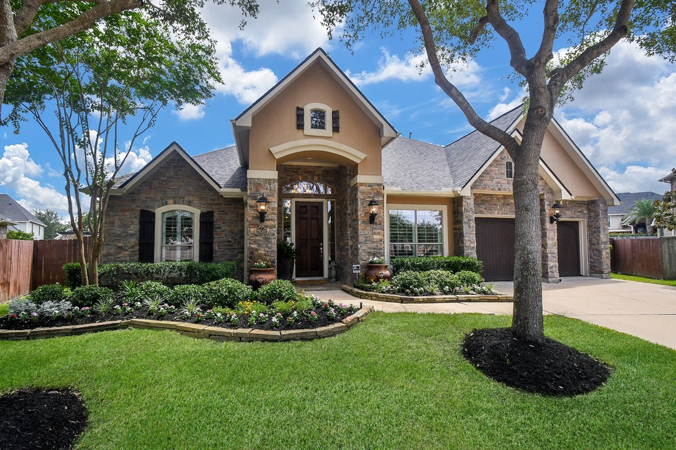 Gorgeous 1.5  story home on a fantastic lot. Stone and Stucco Elevation. 3 car tandem garage. Built by Partners in Building.
