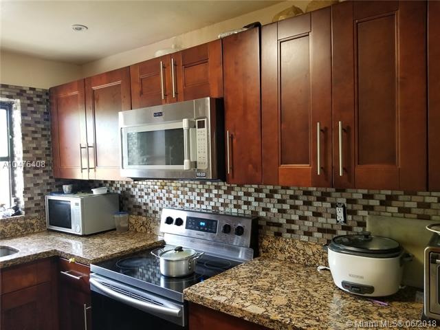 New Kitchen with granite and wood cabinets
