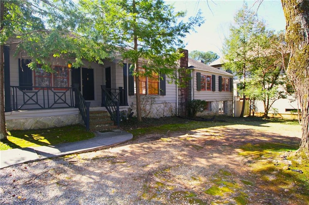 Front view showing the two entry doors on porch. R