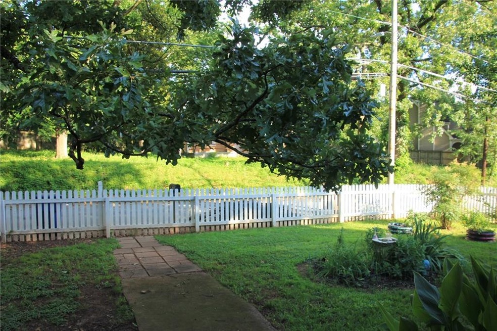 Fully fenced-in large front yard