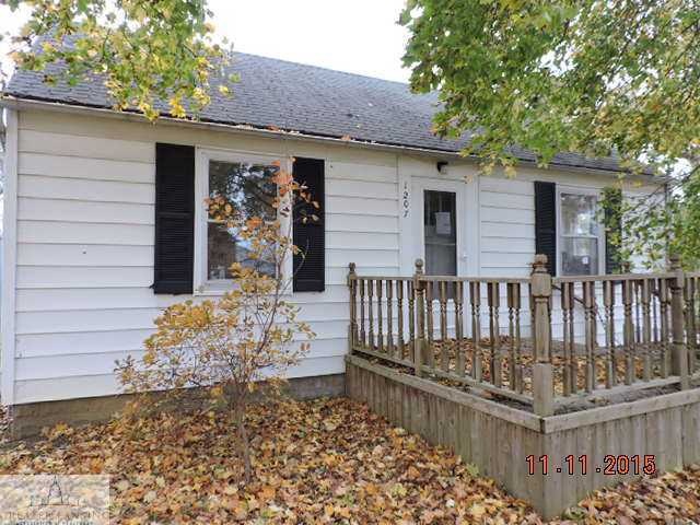 1207 W Miller Rd, Lansing, MI 48911 - photo 1