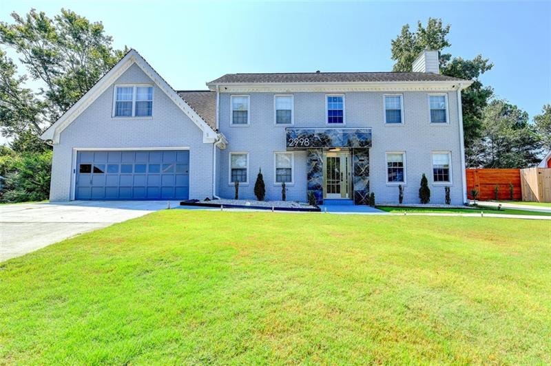 2998 Winding Way SW, Lilburn, GA 30047 - photo 1