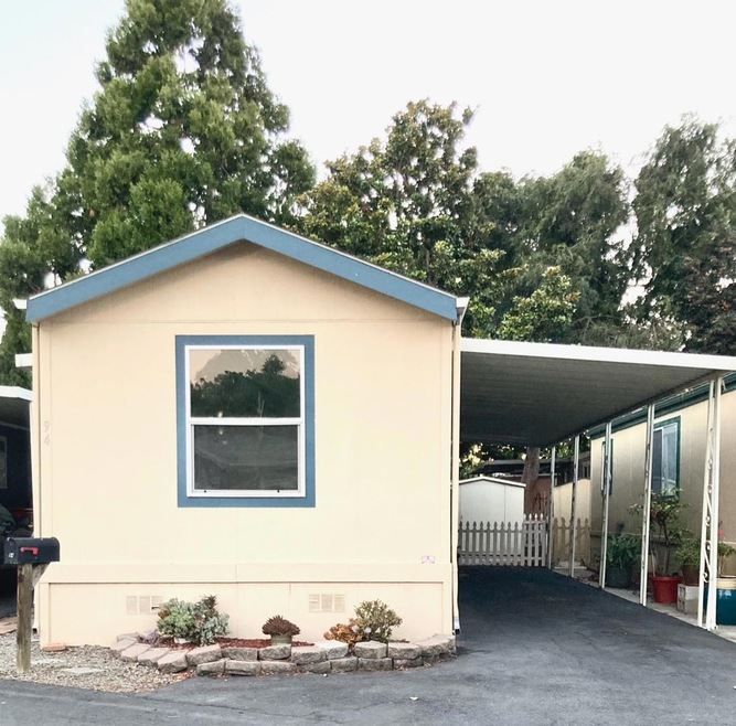 This 2006 home was tied to the lot and is now real