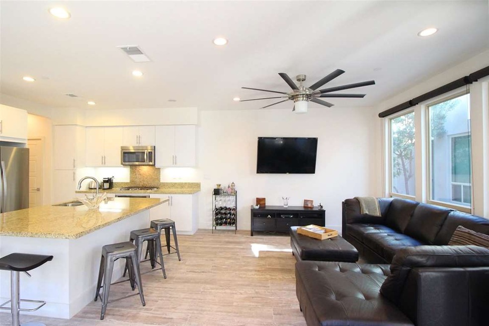 Open living, dining and kitchen area