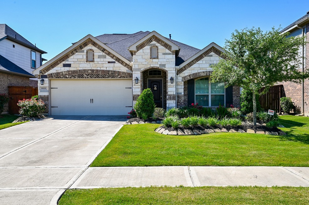 Beautiful brick and stone 1.5 Lennar home with upgrades galore. Take a look!